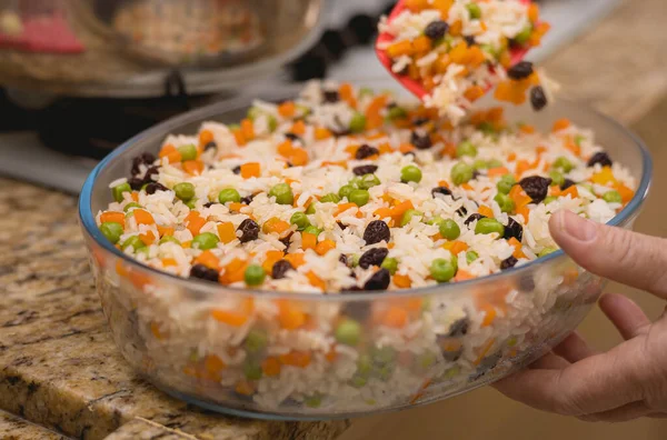 Arroz, Arroz  grega. Brazilian food. BrasilGreek-Style Rice. Brazilian dish. In this image contains rice, raisins, carrots and peas.