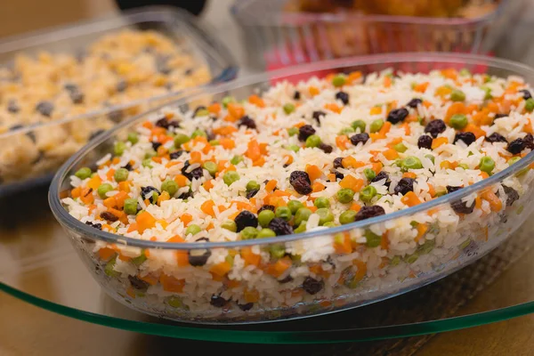 Arroz, Arroz  grega. Brazilian food. BrasilGreek-Style Rice. Brazilian dish. In this image contains rice, raisins, carrots and peas.