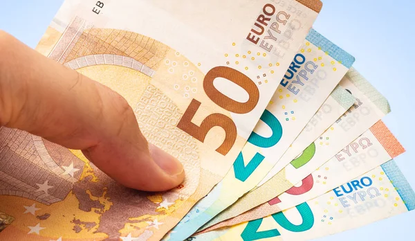 Cash Euro Eur Man Holding Fan Shaped Euro Banknotes Blue — Stock Fotó