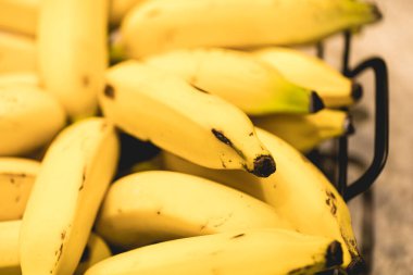 pile of yellow bananas on the table. Macro photography