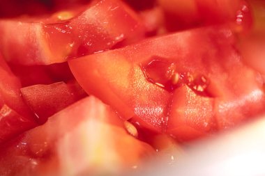 close-up view of chopped tomatoes pieces