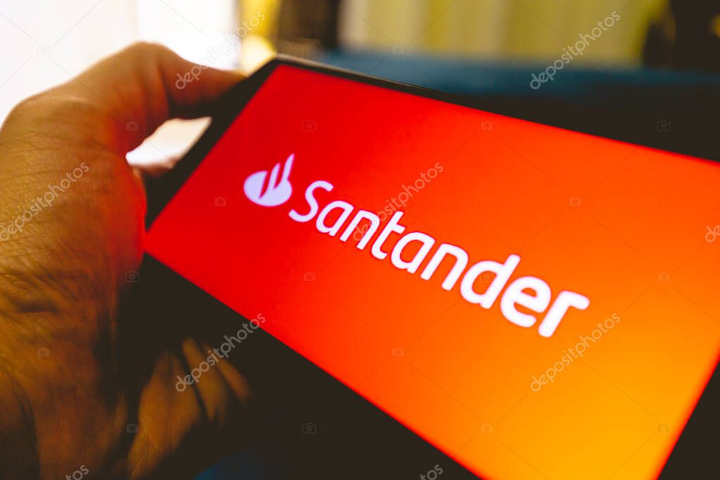 Brasilia, Federal district - Brazil. 2022. Santander bank logo on the phone screen