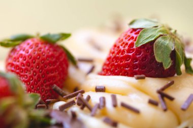 Delicious chocolate cakes decorate with red strawberries