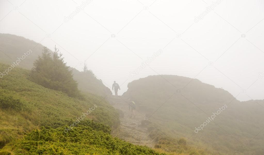 Trekking in fog, Carpathian Mountains, Romania