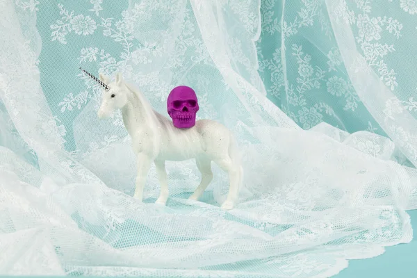 Shiny White Unicorn Carrying Plastic Skull Its Back Minimal Creative — Stock Photo, Image