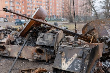 Military army vehicle tank on tracks with barrel during Ukraine war, army tank of armored military metal from Ukraine war, military tank is protective weapon for strong country army in Ukraine war