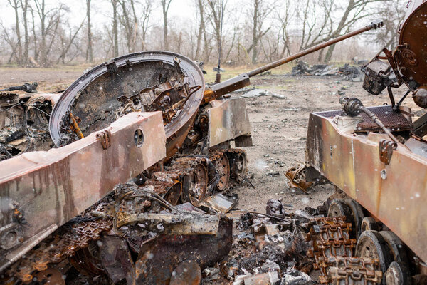 Military army vehicle tank on tracks with barrel during Ukraine war, army tank of armored military metal from Ukraine war, military tank is protective weapon for strong country army in Ukraine war