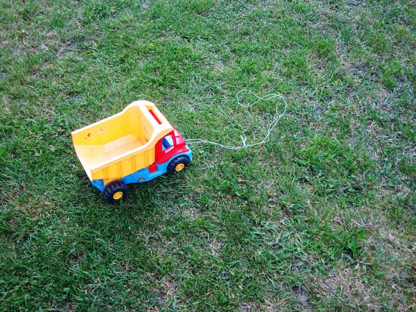 Photo Theme Plastic Large Children Toy Truck Blue Rope Lying —  Fotos de Stock