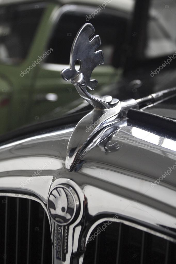 Mlada Boleslav, Czech republic - June 14, 2012: Detail of the bonnet of classic car Skoda with the old emblem of the company. Photo taken on June 14, 2012 in Skoda Cars Museum in Mlada Boleslav.