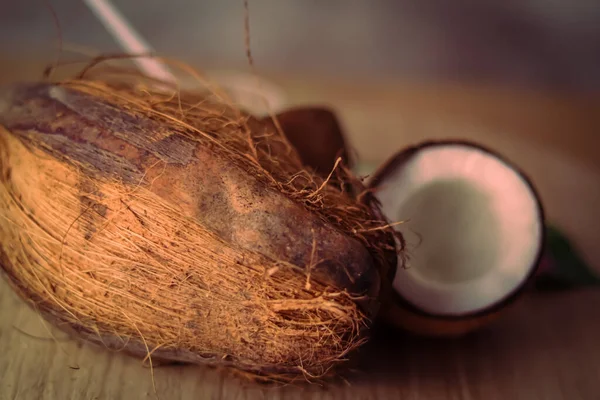 healthy coconut milk with whole nut, whole coconut and coconut milk with coconut powder on wooden table,fresh nariyal hd footage ,selective focus on subject,
