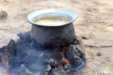 Dry cow dung for a fire in gujarat,tea is made using cow dung, natural tea ,indian village tea