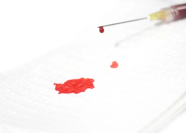 Drip of blood from needle — Stock Photo, Image