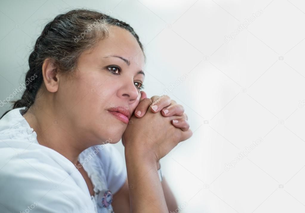 Contemplative Hispanic Woman