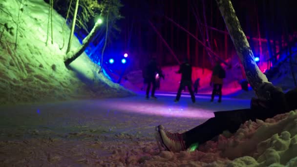 Ice Rink Girl Resting Lying Snow Night Forest Ice Frozen — Stock Video