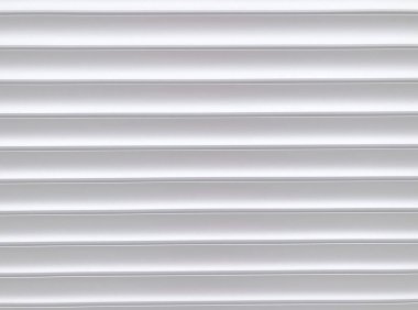 Beyaz kıvrımlı metal yüzey dokusu