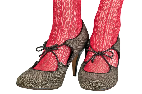 Women's legs in red delicate tights with retro shoes — Stock Photo, Image
