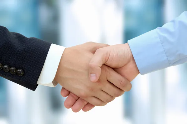 Close-up image of a firm handshake  between two colleagues — Stock Photo, Image