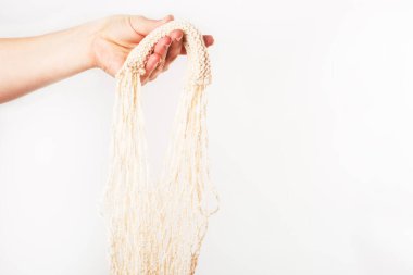 Plastiksiz. Beyaz arka planda tekrar kullanılabilir pamuk alışveriş torbası. Sıfır israf kavramı. Metin için boşluk. Boşluğu kopyala