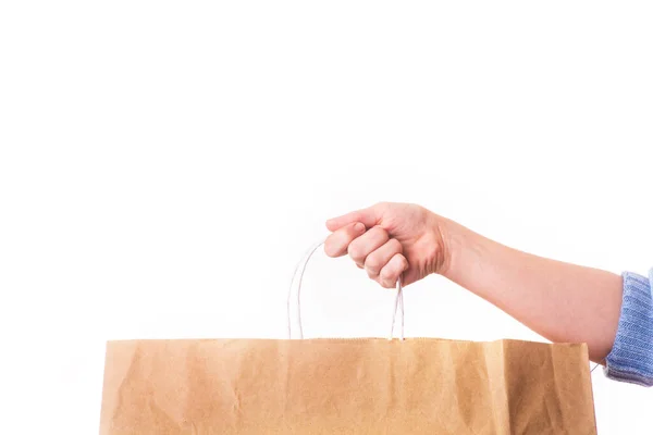 Beyaz sırtlı, elinde kese kağıdı vardı. Polietilen konsept yerine kağıt poşetler kullanarak, kopyalama alanı ve pankart kullanarak. Sıfır atık, plastik yok. izole