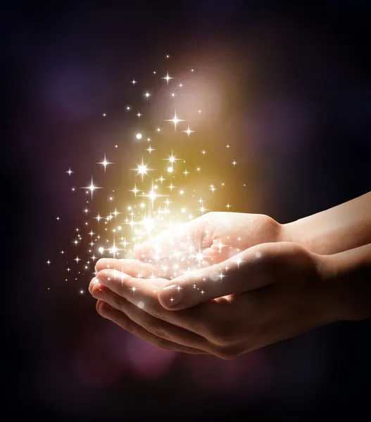 Stardust and magic in your hands — Stock Photo, Image