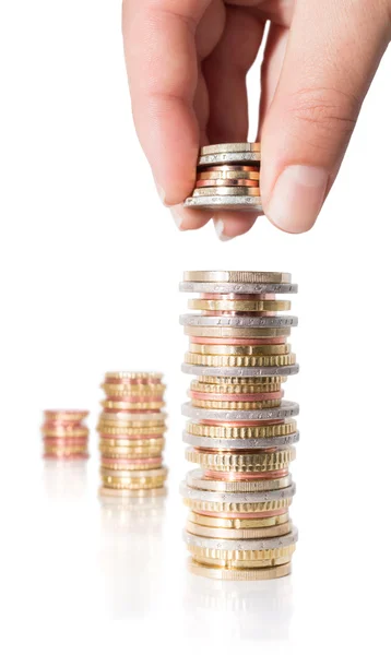 Stack coins with hand - increasing revenue — Stock Photo, Image