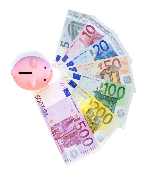 在欧元纸币上 piggibank — 图库照片