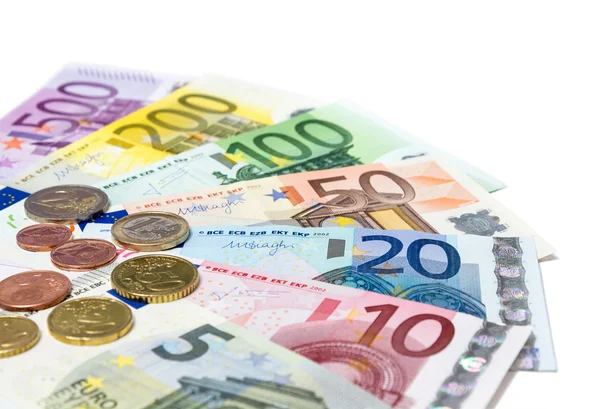 Coins and banknotes euro on white — Stock Photo, Image