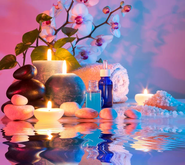 Preparation for bath massage in chromotherapy - cyan red — Stock Photo, Image