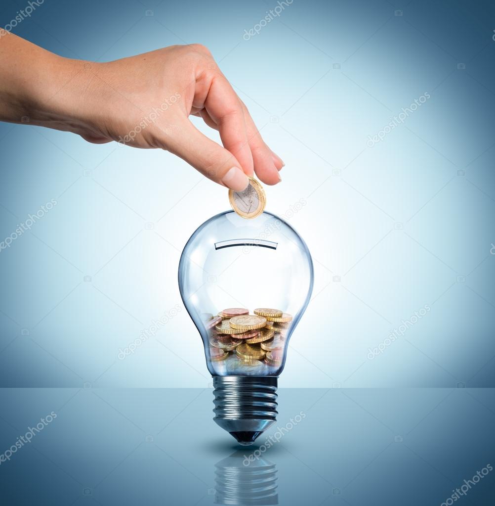 Invest to energy concept - euro in bulb - piggybank