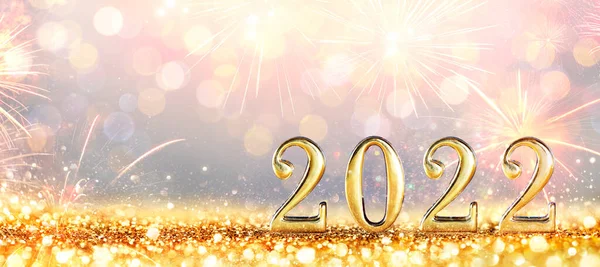 2022 Nieuwjaarsviering Gouden Cijfers Glitter Met Vuurwerk Gedeconcentreerde Achtergrond — Stockfoto