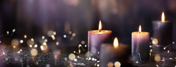 Advent Candles Four Purple Votive Candlelight Church Defocused Abstract Lights — Fotografia de Stock