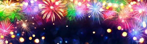 Havai fişekler - Mavi Gecedeki Renkli Işıklarla Yıldönümü Kutlaması - Soyut Odaklanmış Bokeh