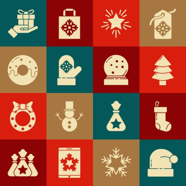 Noel Baba şapkası, çorap, ağaç, yıldız, eldiven, tatlı jöleli çörek, hediye kutusu eli ve kar küresi ikonu koyun. Vektör