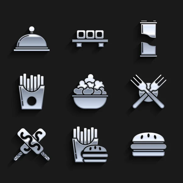 Set Popcorn in kom, Burger en frites kartonnen doos, gekruiste vork, ijs, aardappelen, blikje frisdrank en bedekt met een dienblad met voedsel pictogram. Vector — Stockvector