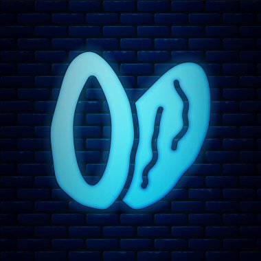 Parlayan neon tarih meyvesi simgesi tuğla duvar arkasında izole edilmiş. Vektör