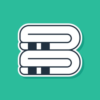 Mavi havlu yığını simgesi yeşil arkaplanda izole edildi. Vektör