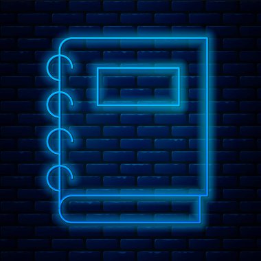 Parlayan neon hattı Not Defteri simgesi tuğla duvar arka planında izole edildi. Spiral not defteri simgesi. Okul defteri. Yazı tahtası. Okul günlüğü. Vektör