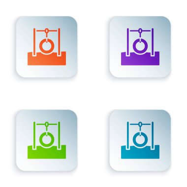 Color Car tire hanging on rope icon isolated on white background. Playground equipment with hanging rope with tire. Set colorful icons in square buttons. Vector.