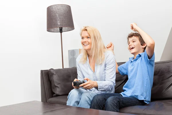 Mother and son playing a video game — Stock Photo, Image