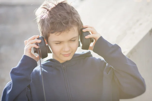 Young boy with headphones in vintage look — Stock Photo, Image