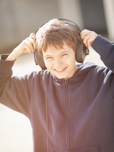 Young boy with headphones in vintage look — Stock Photo, Image