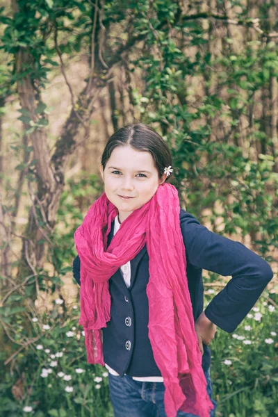 Young girl in a forest — Stock Photo, Image