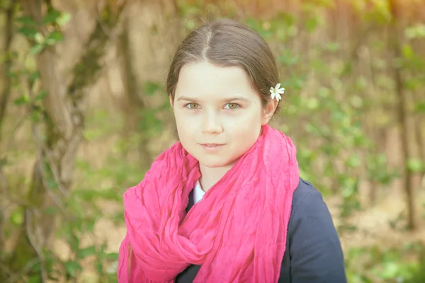 Young girl in a forest — Stock Photo, Image