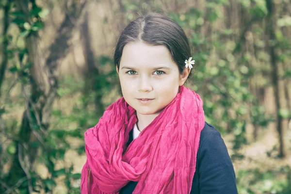 Young girl in a forest — Stock Photo, Image