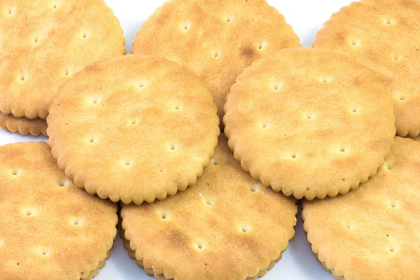 Biscoitos amarelos em fundo branco — Fotografia de Stock