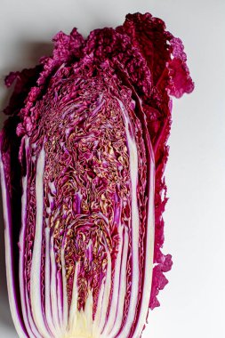Red Napa, Chinese Cabbage. Red cabbage one slice isolated on white background. Clipping Path.