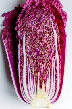 Red Napa, Chinese Cabbage. Red cabbage one slice isolated on white background. Clipping Path.