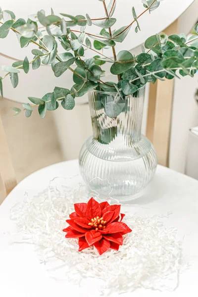 Closeup Red Christmas Poinsettia Flowers Candles Eucalyptus Leaves Christmas Candles — Stockfoto