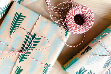 Gift boxes with minimalist style wrapping design. The concept of celebration events and wrapping gifts. Flat lay, top view. Merry Christmas and Happy New Year!