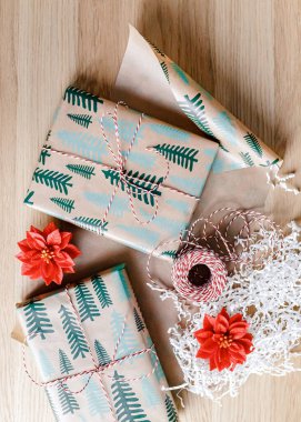 Gift boxes with minimalist style wrapping design. The concept of celebration events and wrapping gifts. Flat lay, top view. Merry Christmas and Happy New Year!
